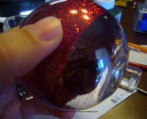 Evenly coat the inside with glitter,